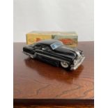 A Vintage boxed Minister Delux Mechanical black model car [25cm in length]