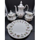 A 5 Piece Royal Albert 'Winsome' tea/ coffee pots, cake plate, sugar and cream. [2nd's]