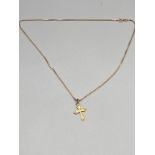 A 9c gold cross pendant with a 9ct gold necklace. [40cm in length] [3.55grams]