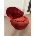 An Art Deco single chair with foot stool. Upholstered in a red material.