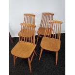 A Lot of four retro dining chairs.