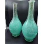 A Rare pair of Scottish art glass vases in green with black and gold aventurine, possibly Monart. [