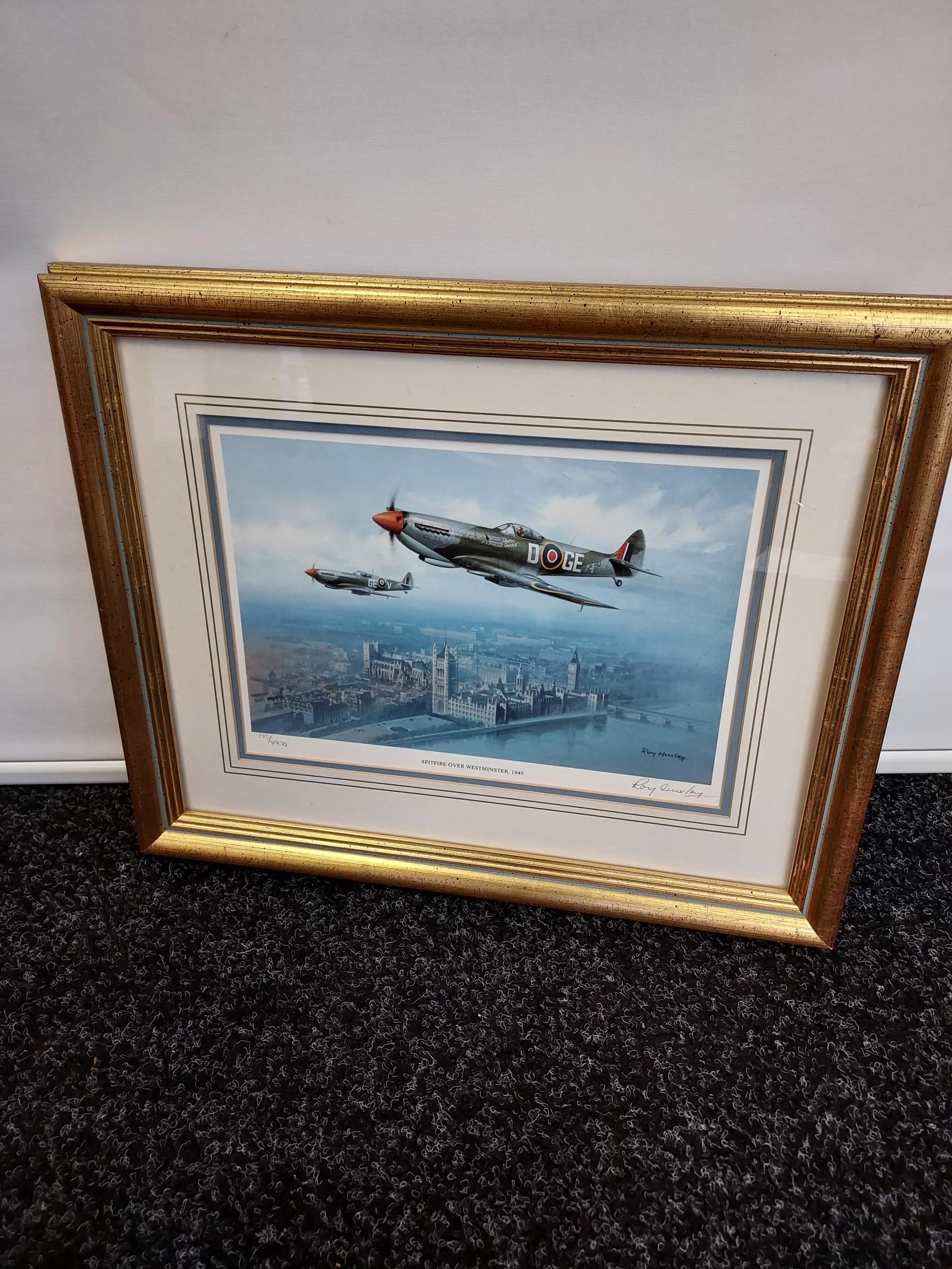 A Limited edition print [375/4950] titled 'Spitfire over Westminster 1945' by Roy Huxley. [Frame