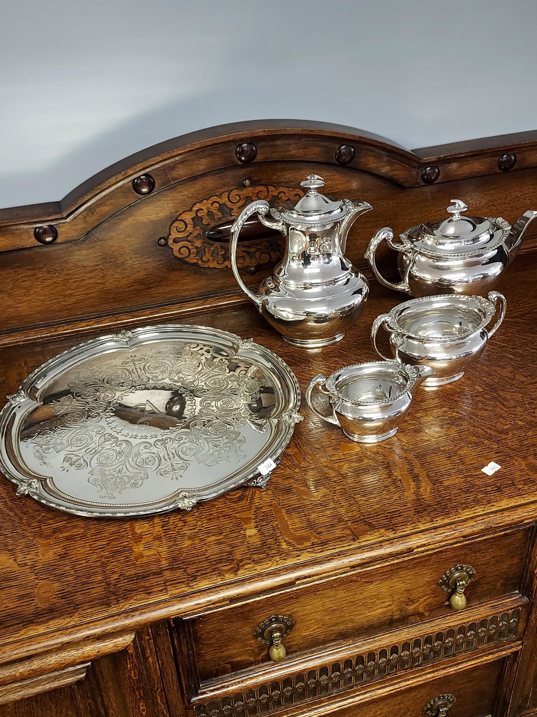 An Antique Walker and Hall E.P Tea/ Coffee service together with an Engraved E.P Serving tray.