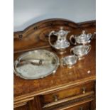 An Antique Walker and Hall E.P Tea/ Coffee service together with an Engraved E.P Serving tray.