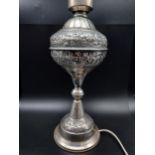 An Antique Cyprus 830 silver hall marked table lamp designed with embossed roses and foliage. [