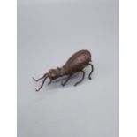 A 19th century [possibly earlier] Far Eastern Bronze sculpture of a beetle. [2.5x6.5x2cm]