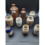 A Collection of stoneware pottery cream and ink pots.