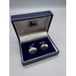 A Pair of Sterling silver cufflinks with presentation box.