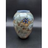 A Royal Doulton flower drip glaze design vase. [18cm in height]