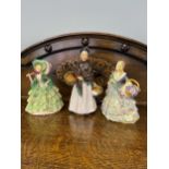A Royal Doulton figurine titled 'The Orange Lady' HN1759 together with 2 early art nouveau Crinoline