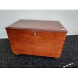 An 19th century solid mahogany blanket box with brass feature handles. [45x68x46cm]