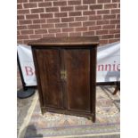 A 19th century Chinese two door cupboard unit [100x73x41cm]