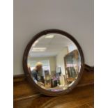 A 19th century round bevel edged mirror. [60cm]