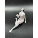 An Art Nouveau porcelain nude lady figurine. [Blue Crown and L Stamp to base] [9x13x9cm]