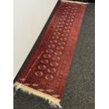 An antique hand woven Persian style, hall way runner rug. [246x71cm]