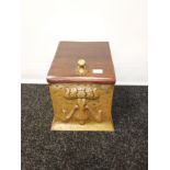 An Edwardian arts and crafts brass coal box. Has original liner and wooden top.