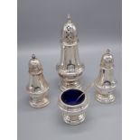 A Lot of four Birmingham silver condiment items. Includes Sugar Shaker, Salt and Pepper pot and