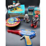 A Collection of various vintage tin plate clockwork space models. To include Shudo Astroray gun,