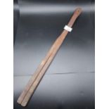 A John Dick of Lochgelly leather tawse/ school belt. [52cm in length]