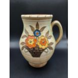 A Charlotte Rhead Crown Ducal water jug 'flower basket pattern' [22cm in length]