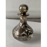 A nice example of an art nouveau perfume bottle with stopper and silver overlay. [height 8cm]