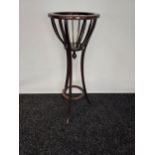 A 19th century mahogany plant pot stand. [96cm in height]