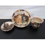 Three lots of Irma Demianczuk cat design studio pottery pieces.