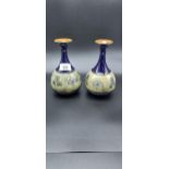 A Pair of Royal Doulton Lambeth bud vases [18cm in height]