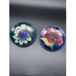 A Lot of two Moorcroft pin dishes. Plum and bird pattern and Hibiscus pattern. [12cm in diameter]