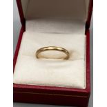 A 9ct gold Chester marked Wedding band. Ring size P. [1.70grams]