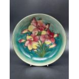 A Nice example of a Moorcroft African Lily Pattern bowl. Impressed marking and signature to the