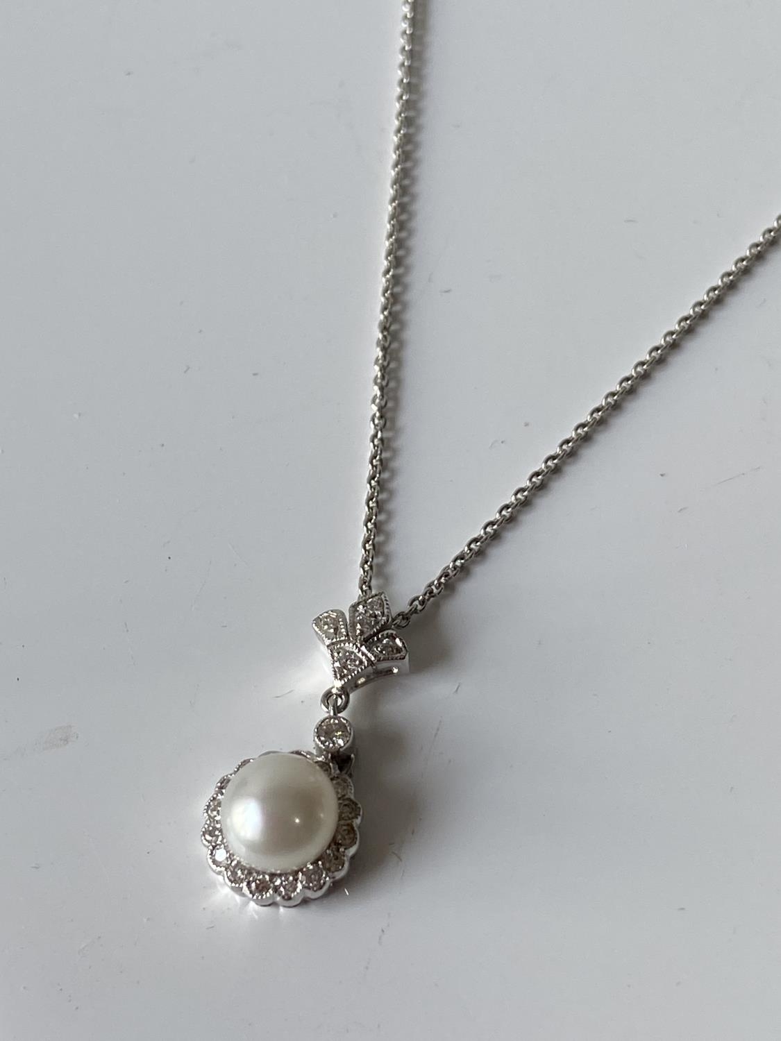 An 18ct white gold diamond cluster & single pearl pendant with an 18ct gold necklace [length - Image 3 of 6