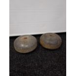 A Lot of two antique granite curling stones.