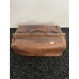 Antique brown leather doctors bag.
