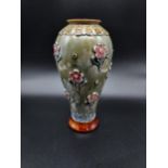 A Doulton Lambeth floral design vase by Emily Partingdon. [20cm in height]