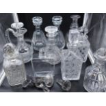 A Collection of crystal and glass cut decanters to include two matching Baccarat decanters, Claret