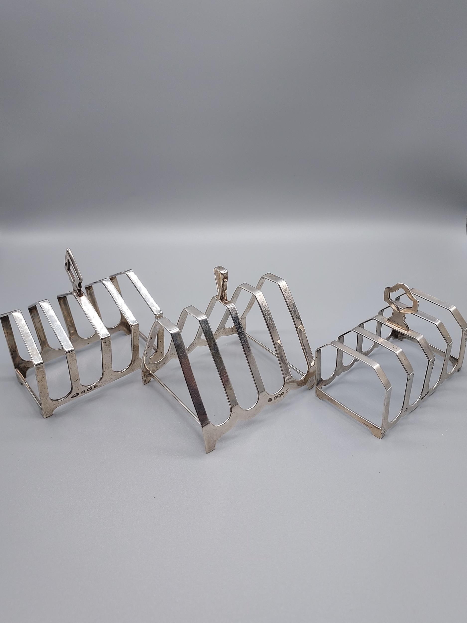 A Lot of three Birmingham silver four slice toast racks. - Image 2 of 2