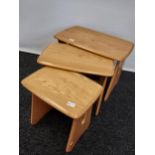 A Set of three Light Elm Wood Windsor Ercol tables [Nest] [45x63x41cm]