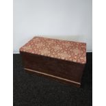 A Victorian Blanket box with Persian carpet to lid. Walnut grain Scumble effect