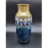 A Royal Doulton Lambeth tall vase. [25cm in height]