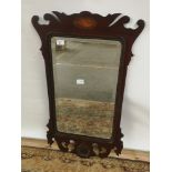 A Georgian bevel edged and bead trim wall mirror, hand carved frame with a centre design to the