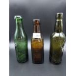 Gilbert Rae Dunfermline brown bottle, Robert Douglas Green bottle and Greenock Apothecary bottle.