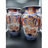 A Pair of large 19th century Japanese Imari pattern vases. [32cm in height] [One As Found]