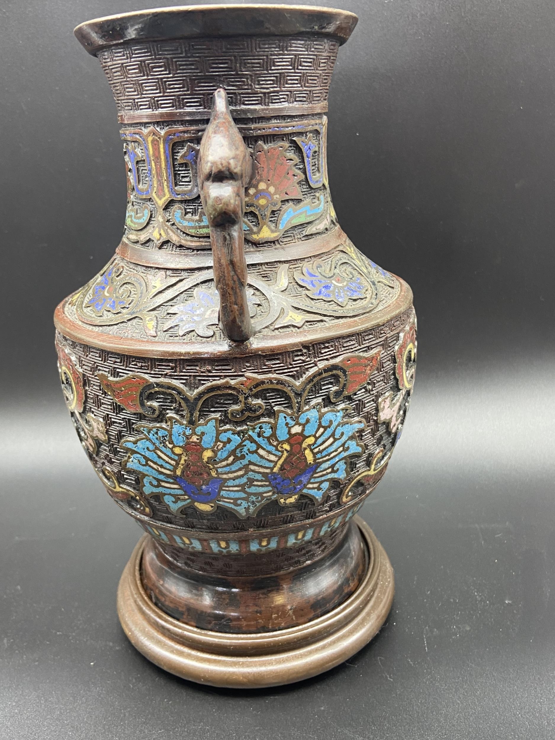 A 19th century Japanese bronze Champleve Enamel Cloisonne urn vase. Comes with wooden stand. [26cm - Image 4 of 7