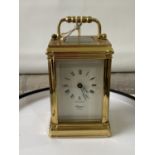 Antique heavy brass carriage clock [Rapport London] [MVT No 1800] in a working condition and with