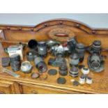 A Collection of vintage cameras and lenses to include Soligor 50mm lens, Hanimex zoom lens, Carl