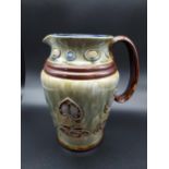 A Royal Doulton Lambeth art Nouveau design water jug. [21cm in height]