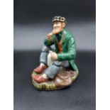 A Royal doulton figure of an old man smoking a pipe