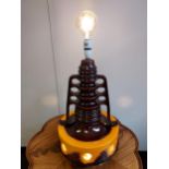 A Retro West German porcelain table lamp. Designed with brown and orange drip glaze. [50cm in